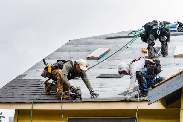 Professional Roofing technician working in Moosup, CT